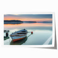 Rolled print of a rowboat on calm water in muted blue and gray tones, suitable for dining room or bathroom wall art.