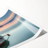 Extra large wall art featuring a rowboat on a calm lake, rendered in subtle blue and gray tones on rolled canvas.