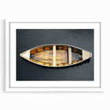 Extra large abstract art print featuring a textured rowboat, in muted earth tones on a framed white canvas.