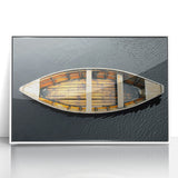 Acrylic print of a mid-century modern rowboat on a lake, in muted blues and grays, framed in white.