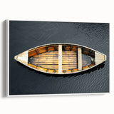 Framed canvas wall art depicting a vintage rowboat on a calm lake, in muted black and gray tones, ideal for bedroom decor.