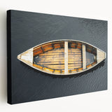 Rowboat on a calm lake, muted blue and gray tones on stretched canvas, ideal for kitchen wall art.