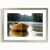 Abstract art print of a rowboat, featuring cool blue and gray tones on a silver-framed canvas.