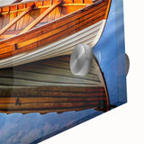 Large abstract wall art of a rowboat in muted gray and blue tones on acrylic glass, ideal for dining room decor.