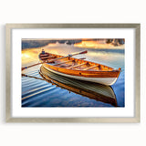 Abstract art print of a rowboat in muted blue and gray tones on framed canvas, suitable for bedroom or dining room decor.