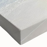 Large art of a black and white rowboat on a calm lake, printed on stretched canvas, suitable for bedroom wall decor.