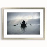 Abstract art print of a rowboat in muted blues and grays on framed canvas, suitable for dining room or bedroom decor.