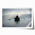 Rolled print of a rowboat on water in muted blue and gray tones, suitable as art wall dining room decor.