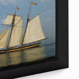 Framed canvas featuring a black sailboat design with colorful, textured accents.