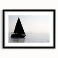 Abstract art print of a colorful sailboat on textured canvas, framed in black, ideal for extra large living room wall art.