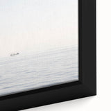 Framed canvas of a colorful, textured sailboat on a black background, ideal for living room decor.