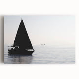 Black and white photo of a sailboat on a calm sea, printed on large stretched canvas, ideal for kitchen wall art.