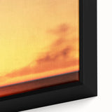 Framed canvas featuring a textured black sailboat on vibrant blue water, ideal for extra large living room decor.