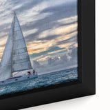 Framed canvas featuring a black sailboat on a textured, colorful background, ideal for extra large living room wall art.