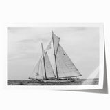 Rolled print of a sailboat on calm waters, using muted blue and gray tones, ideal for art wall dining room.