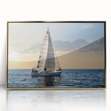 Mid-century modernist art featuring a sailboat, with a gold frame acrylic print, in muted navy and white tones.