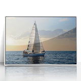 Mid-century modernist style large art print of a sailboat, with muted blue and white tones on framed acrylic.