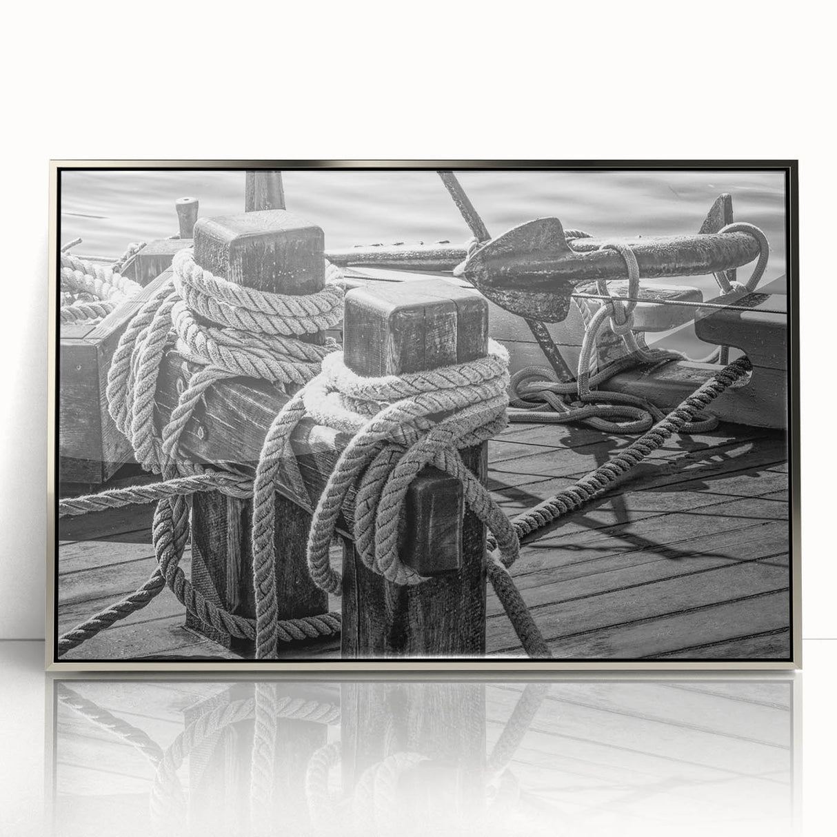 Art deco poster of a sailboat in silver and blue tones, acrylic print in a silver frame.