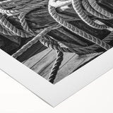 Art deco style poster of a sailboat on a calm sea, rendered in soft blue and white tones, on rolled canvas.