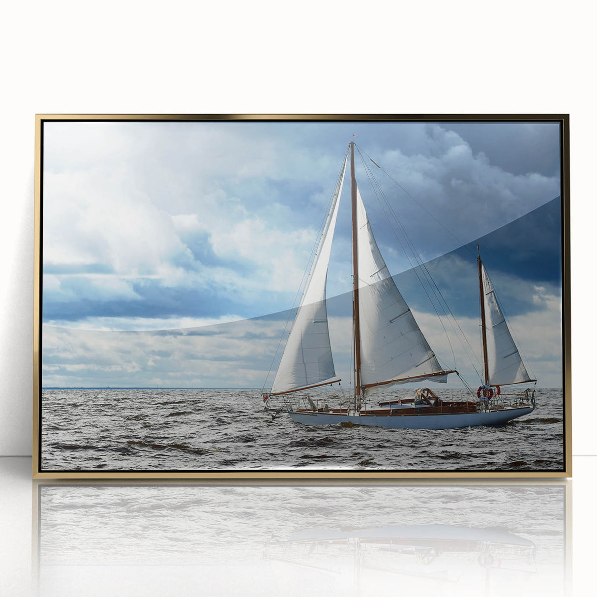 Mid-century modernist art of a sailboat, framed acrylic in gold, using muted blue and white tones.