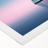 Art deco poster of a sailboat on rolled canvas, featuring sharp geometric forms in muted blues.