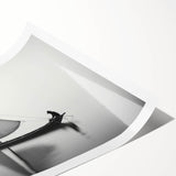 Extra large wall art featuring a sailboat on a muted blue and gray sea, printed on rolled canvas.