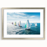 Abstract art print of a sailboat in muted blue and gray tones on a silver-framed canvas, suitable for dining room decor.