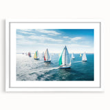 A large abstract art print of sailboats with textured blue and white hues, framed in white, ideal for living room decor.