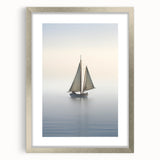 Abstract art print of a sailboat in silver frame, featuring cool blue and gray tones.