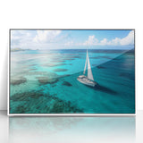 Mid-century modernist art depicting a sailboat in muted blue and white tones on framed acrylic.