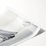 Extra large wall art showcasing a sailboat on a vibrant blue ocean, printed on rolled canvas.