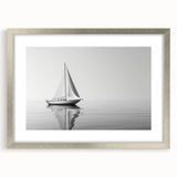 Abstract art print featuring a stylized sailboat, with silver frame and mat, in cool blue and white tones.