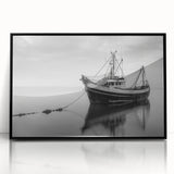 Large abstract wall art featuring a sailboat in muted blue and white tones, framed in black acrylic.