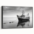 Black and white framed canvas featuring a vintage sailboat on calm waters, suitable for bedroom wall art.