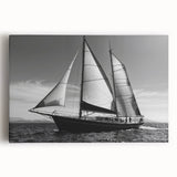 Black and white photograph of a sailboat on stretched canvas, ideal for kitchen wall art.