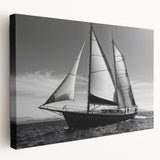 Sailboat on a calm sea depicted in soft blue and white tones on a stretched canvas, ideal for kitchen wall art.