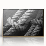 Mid-century modernist art depicting a sailboat, rendered in muted blues and whites on a framed acrylic.