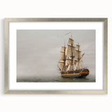 Abstract art print of a stylized ship in silver frame, using cool blue and gray tones.