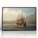 Large abstract wall art depicting a stylized boat, in muted blues and grays, framed in black acrylic.