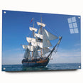 Acrylic print of a large abstract depiction of ships, using deep blue and gray tones, suitable for dining room decor.