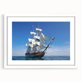 Extra large abstract art print of a textured ship, in muted gray and blue tones on a white framed canvas.