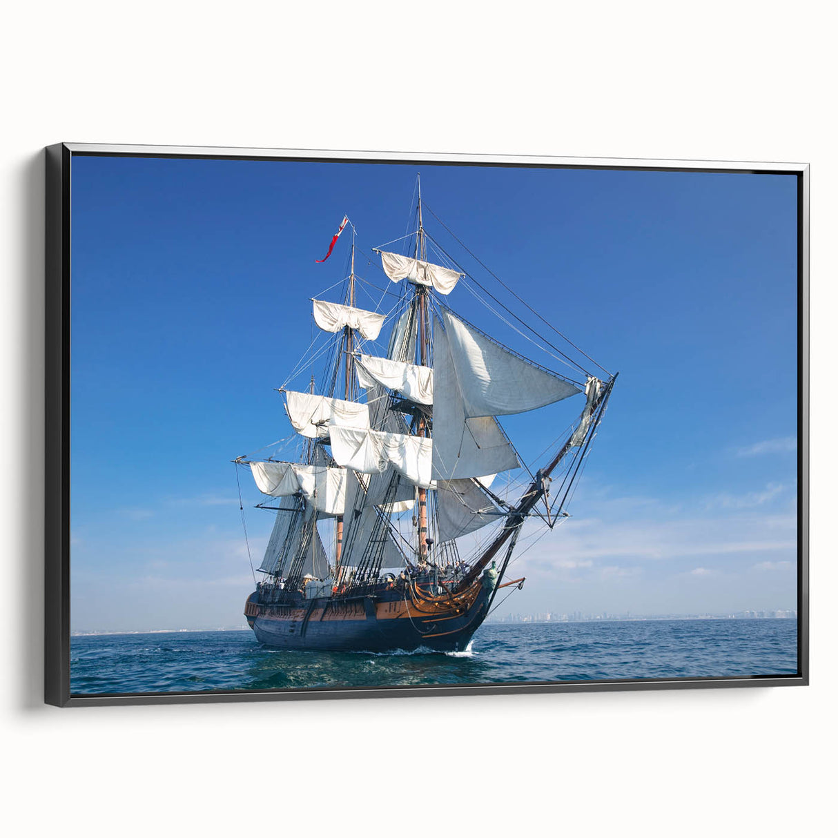 Black and white framed canvas featuring a vintage ship in a landscape setting, ideal for bedroom wall art.