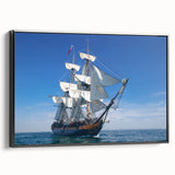 Black and white framed canvas featuring a vintage ship in a landscape setting, ideal for bedroom wall art.