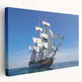 Large art print of a vintage ship in muted blue tones on stretched canvas, ideal for kitchen wall art.