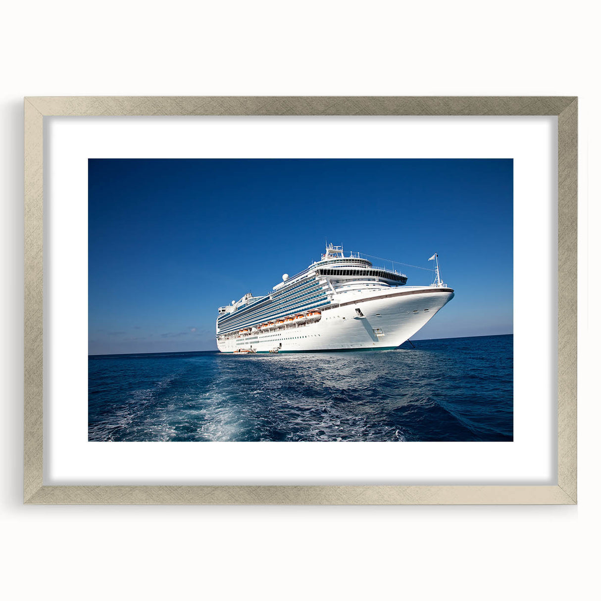 Abstract art print of a stylized ship in silver and blue tones on a framed canvas, suitable for dining room decor.