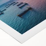 Art deco poster featuring a large ship on a calm sea in muted blue and gray tones on rolled canvas.