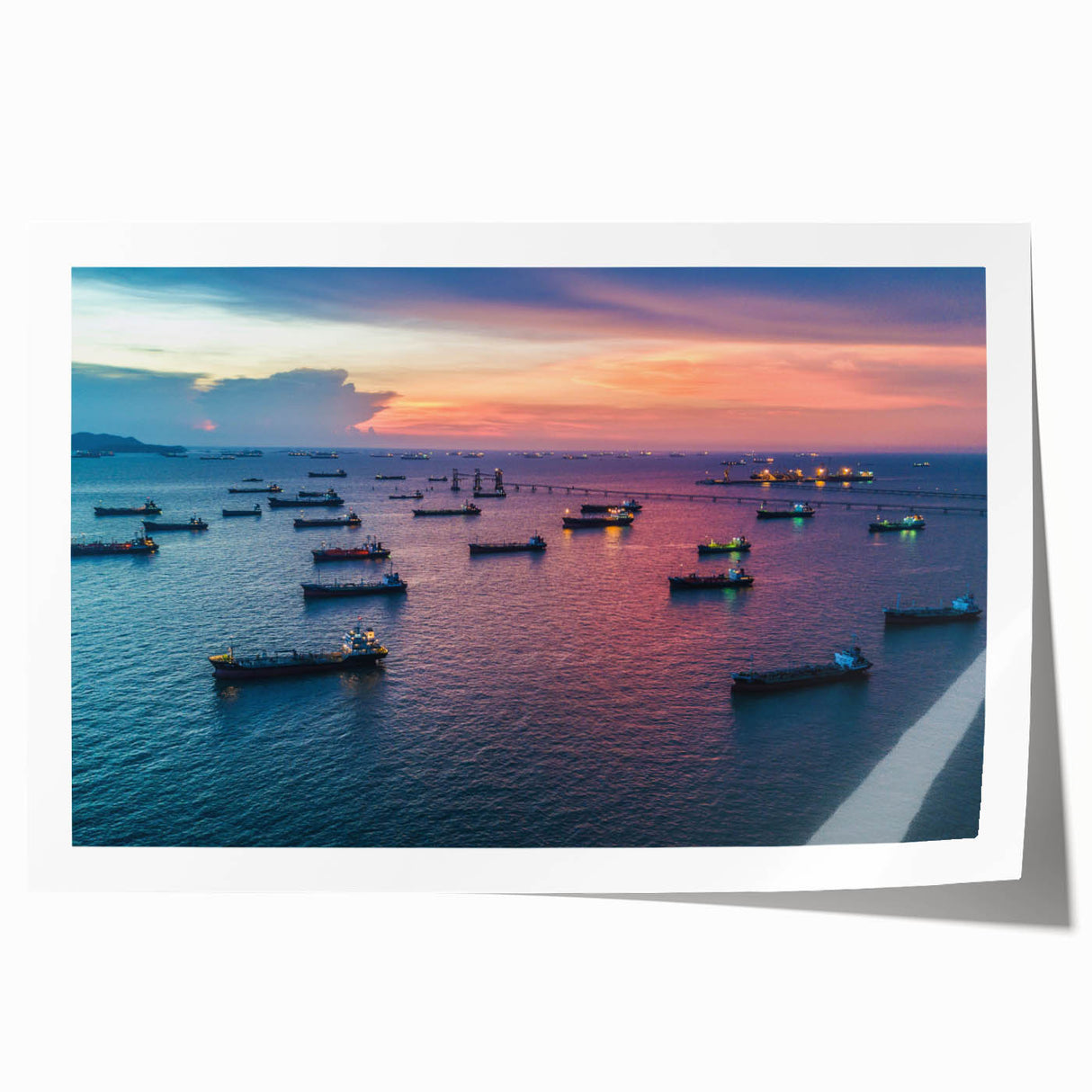 Rolled print featuring a detailed illustration of a ship, executed in dark blue on a white background.