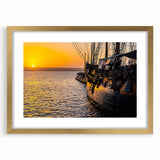 Textured art print of an abstract boat in muted blue and gray tones on a gold-framed canvas, suitable for bedroom wall decor.