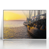 Mid-century modernist style large art print of a ship, featuring muted blue and white tones on framed acrylic.