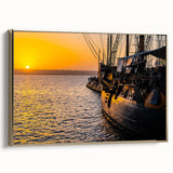 Framed canvas featuring a vintage poster of a ship, rendered in black with colorful accents, ideal for an office or study.